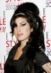 Amy Winehouse poses for naked photos